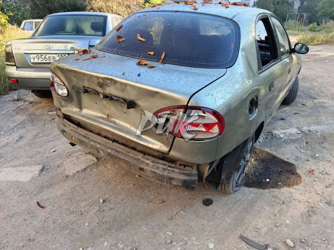 Последствия атаки БПЛА ВСУ на автомобиль в Горловке Последствия атаки БПЛА ВСУ на автомобиль в Горловке